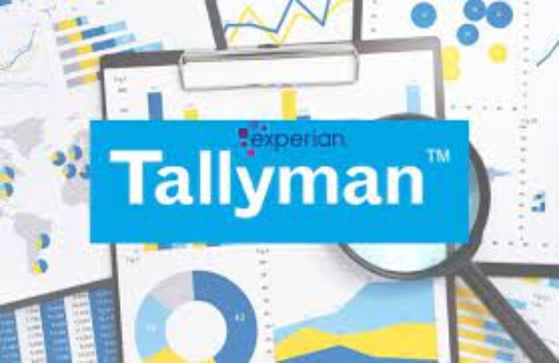 A magnifying glass highlighting the ‘Tallyman’ logo amidst various colorful financial charts and graphs.