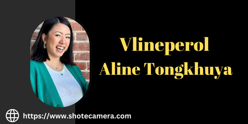 Aline Tongkhuya, also known as Vlineperol, stands confidently against a captivating backdrop, inviting curiosity about her persona and story.