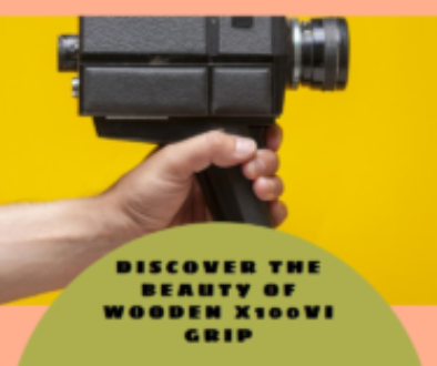 A hand holding a vintage camera with a wooden grip against a bright yellow background.