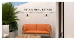 Retail real estate: Modern space with an orange couch, minimalist design, and a plant.